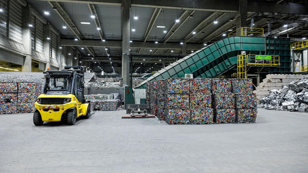 Baled recycled aluminum at a processing facility