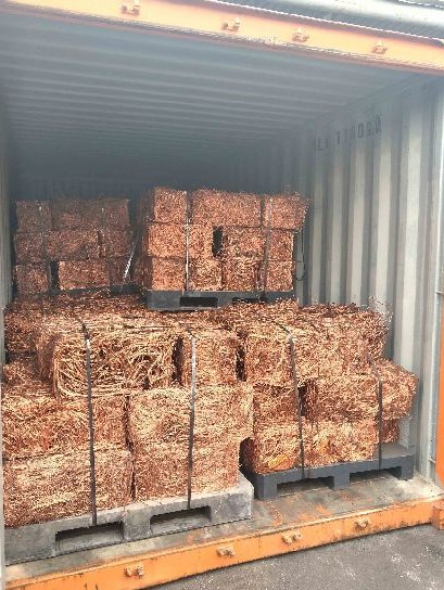 Bundled copper wire scrap loaded in a container
